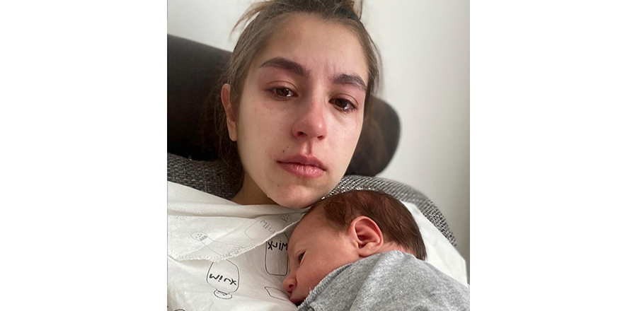 Ukrainian woman with her newborn